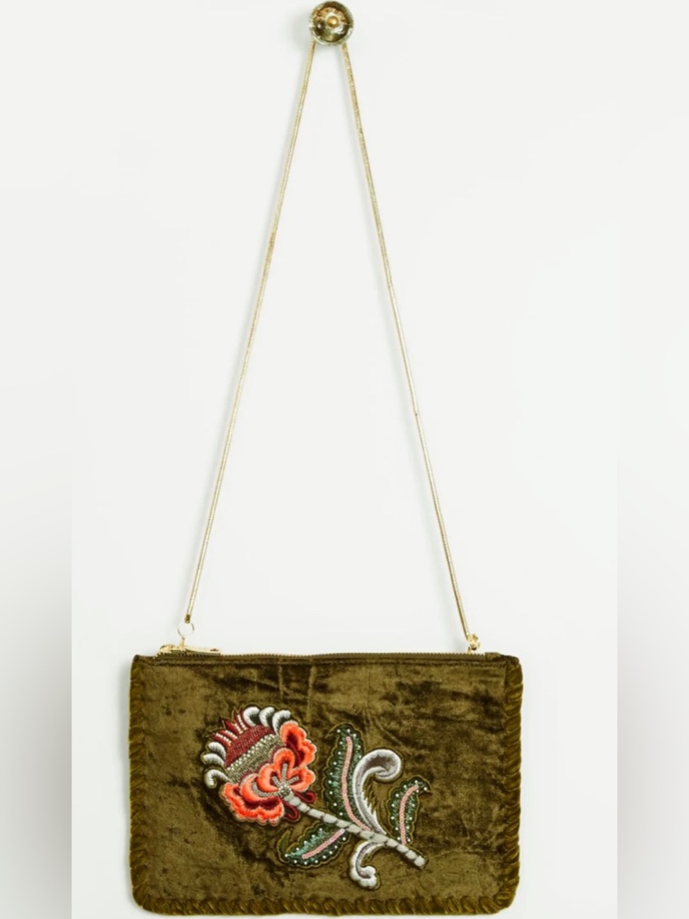 Velour Bag with Embroidered Orchid on the side, hangs from a Faux Gold Strap.